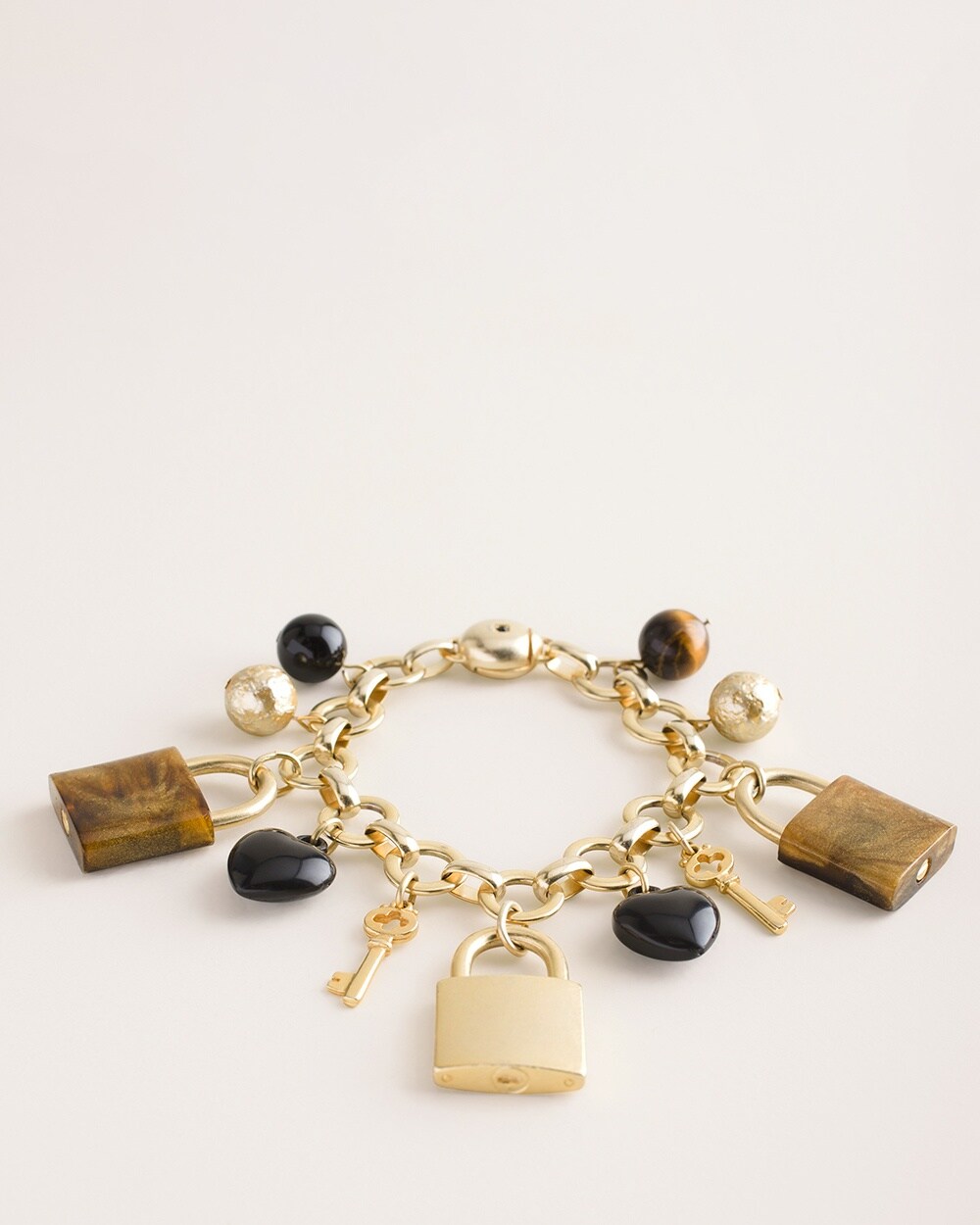 Goldtone and Neutral Locket Charm Bracelet