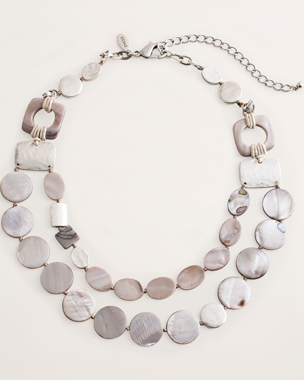 Neutral Shell and Silvertone Multi-Strand Necklace
