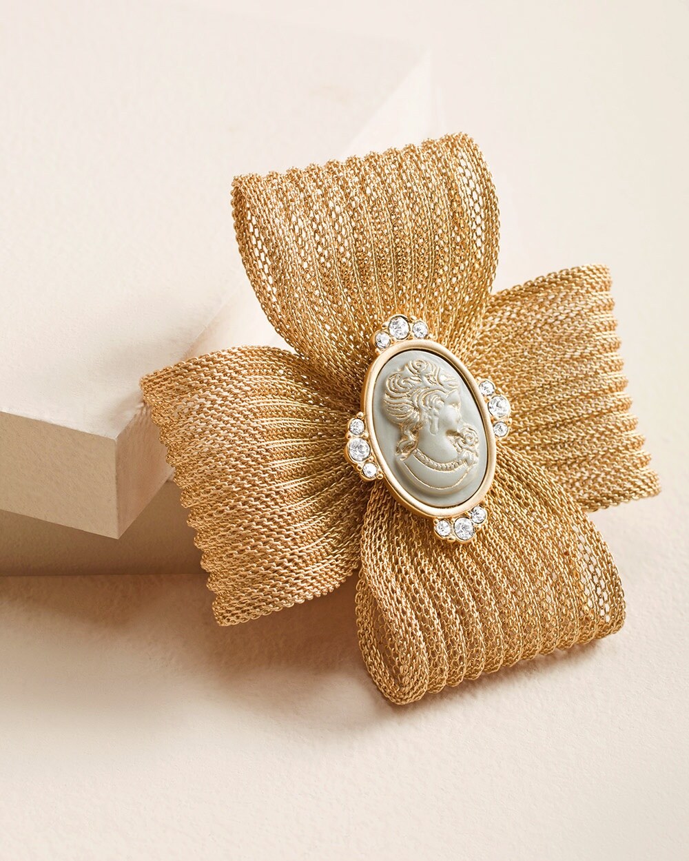 Goldtone Bow Pin with Cameo Design