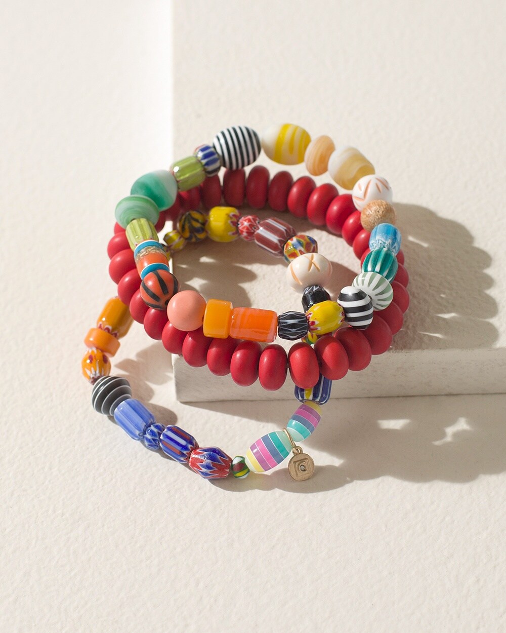 Pair of Multi-Colored Recycled Glass Beaded Bracelets - Festive Sensation |  NOVICA