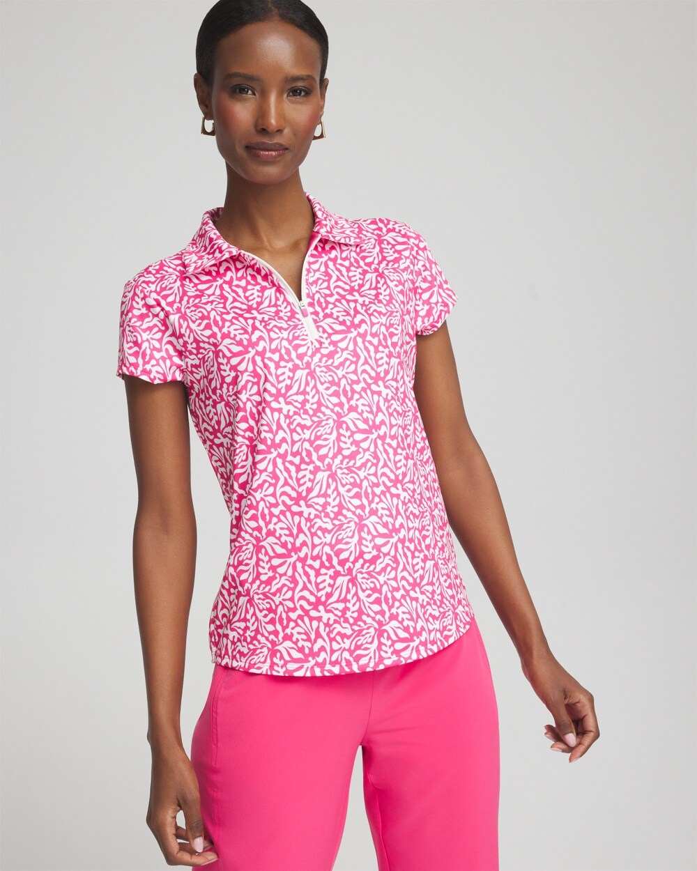 Shop Chico's Upf Sun Protection Reef Cap Sleeve Polo Top In Pink Bromeliad Size 8/10 |  Zenergy Activewear