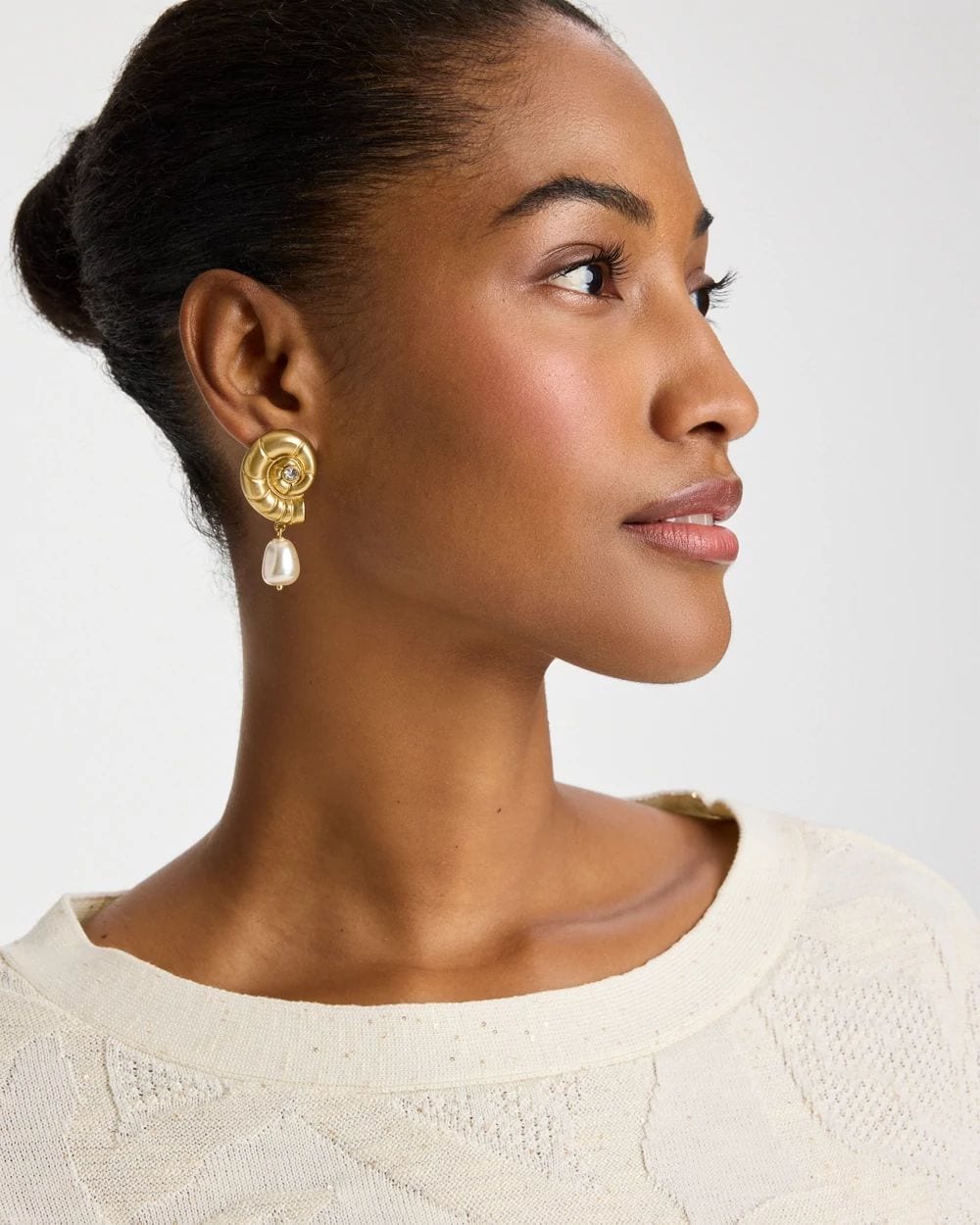 Goldtone Spiral Shell Earrings click to view larger image.