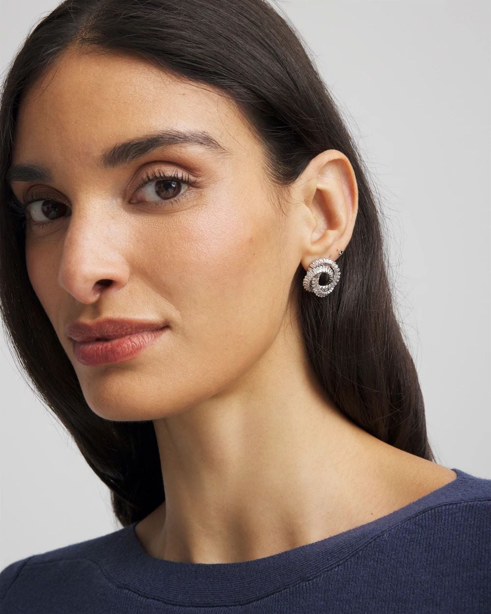 Silvertone Twisted Stud Earrings click to view larger image.