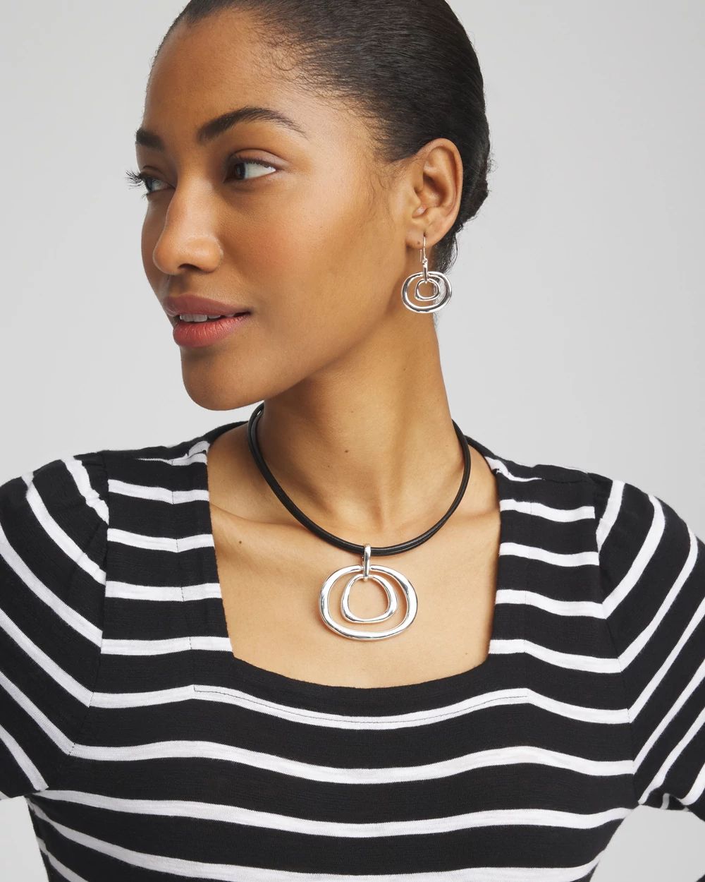 Silver Tone Rings Pendant Necklace click to view larger image.