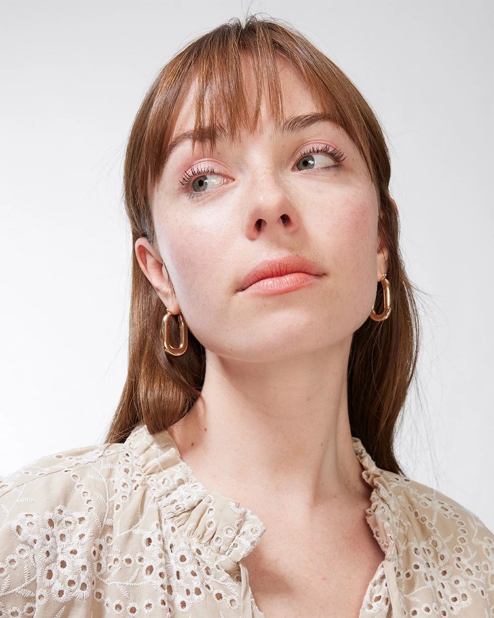 Gold Tone Oval Hoop Earrings