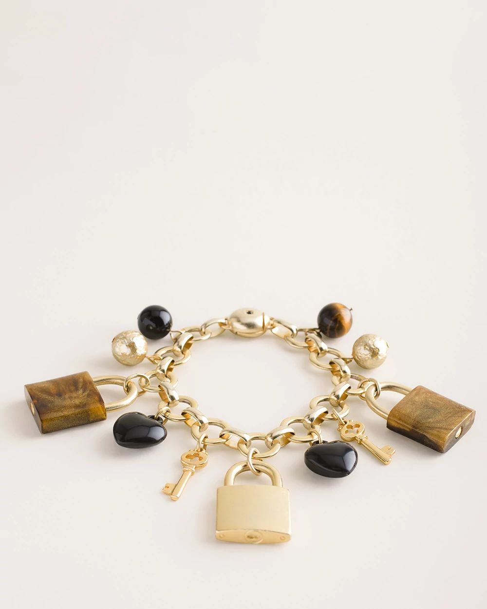 Goldtone and Neutral Locket Charm Bracelet