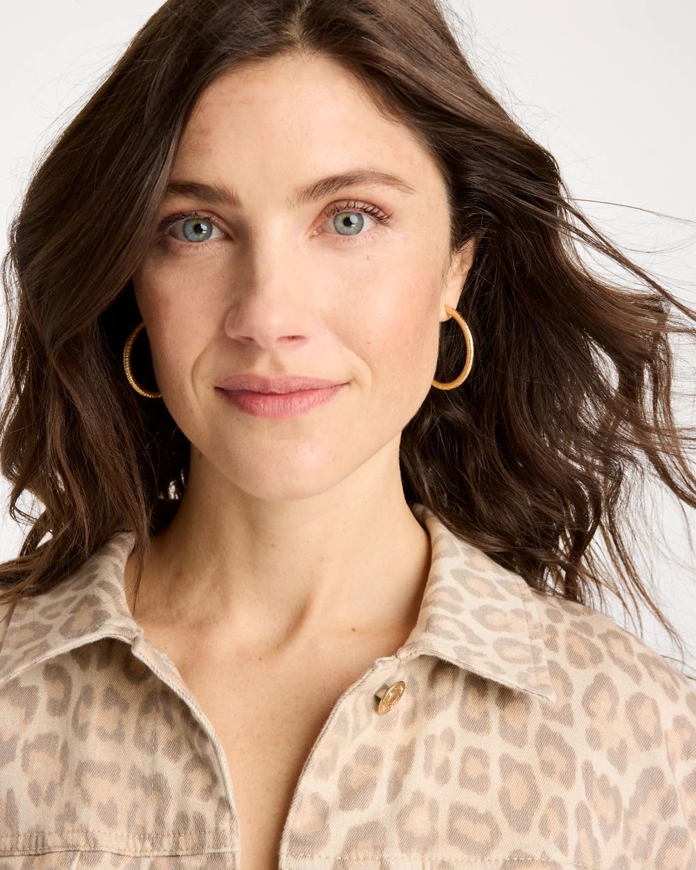 Goldtone Textured Hoop Earrings click to view larger image.