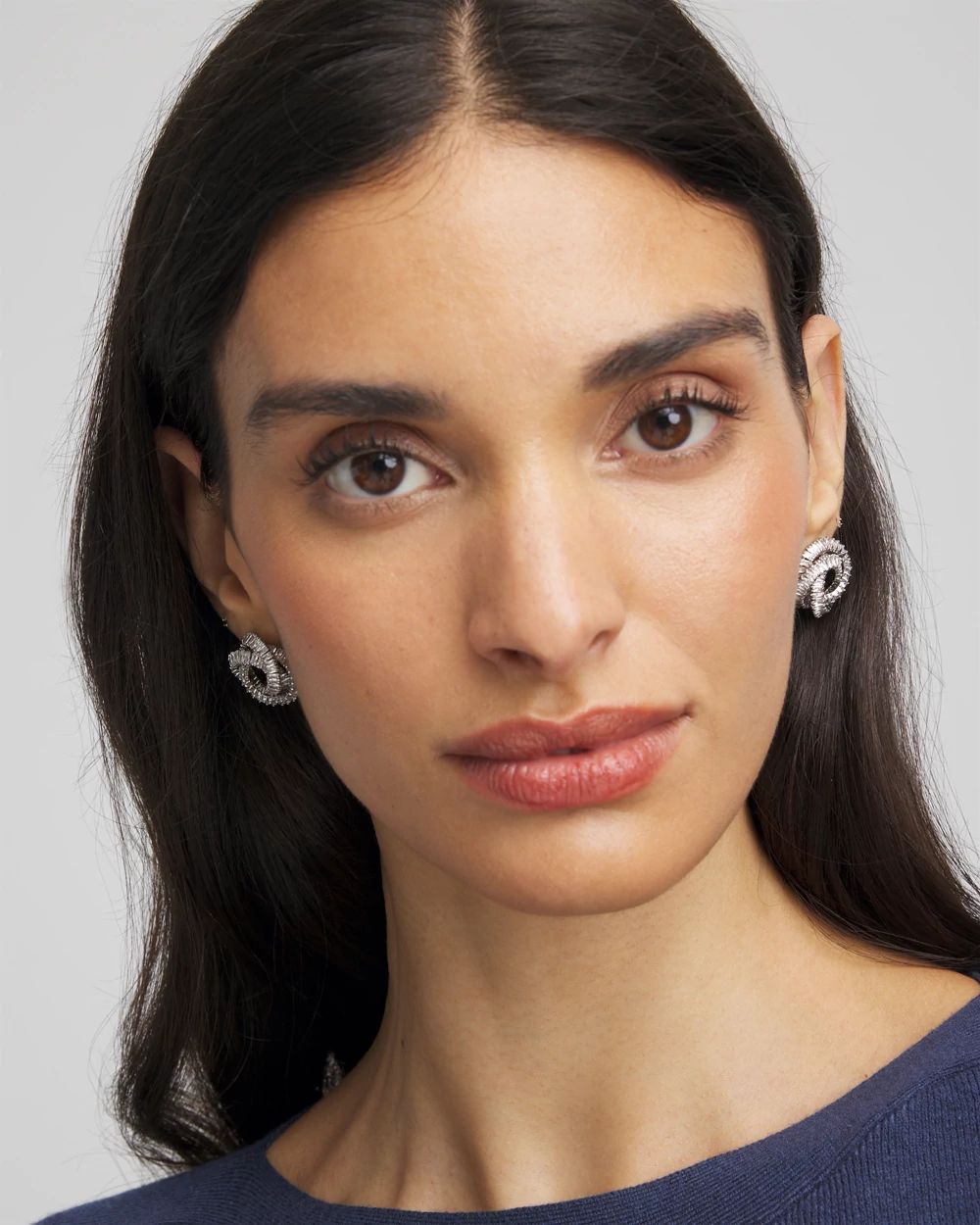 Silvertone Twisted Stud Earrings click to view larger image.