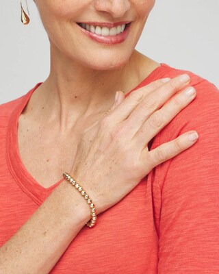 Small Beaded Gold Tone Stretch Bracelet click to view larger image.