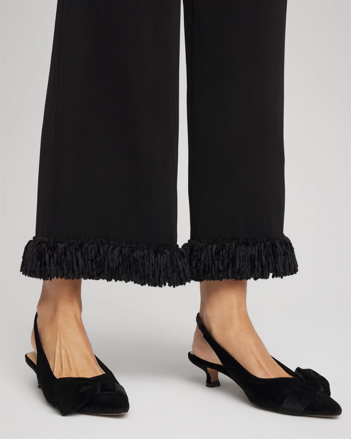 Chico's Travelers Fringe Hem Cropped Pants In Black In Black